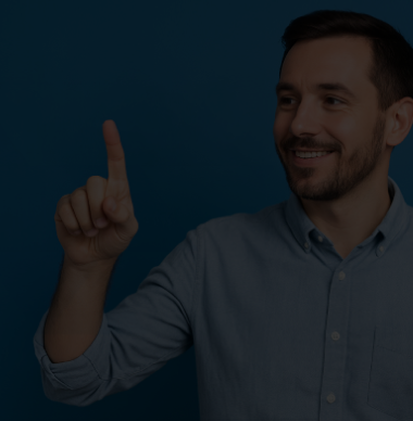 Smiling man pointing upward on blue background, representing user-friendly digital interface and intuitive technology interaction.